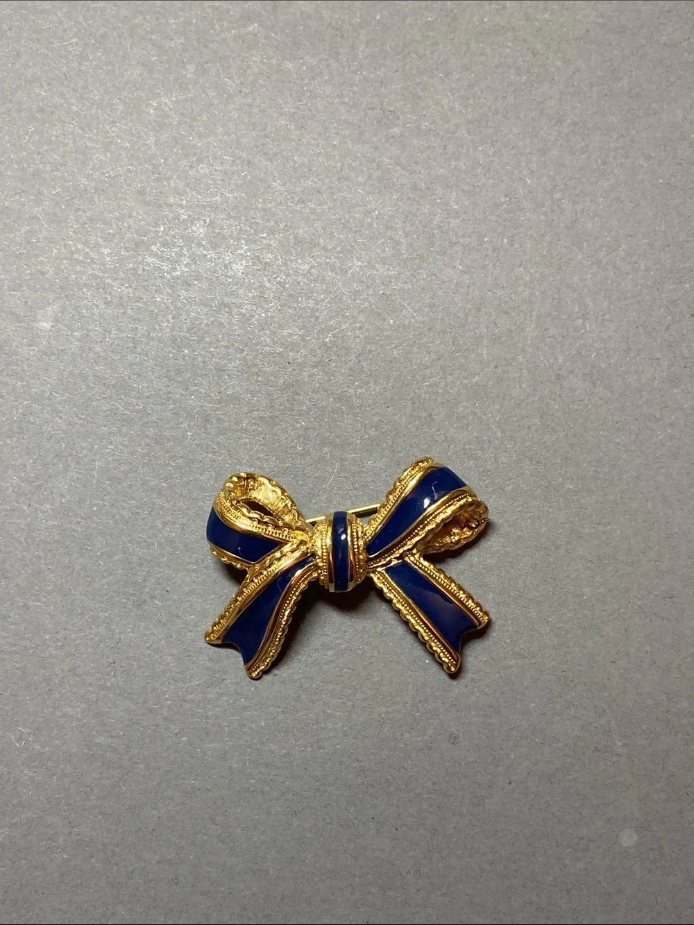 Vintage gold navy enamel bow pin brooch